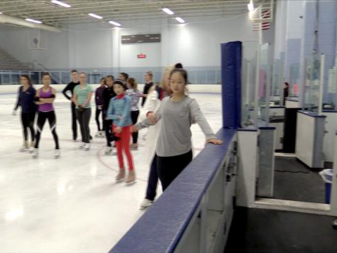 Flying Reverse Sit Spin (Kim Ryan)